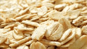 Explore the world of nutrition in a captivating macro video showcasing the intricate textures and details of rolled oats. Witness the balance of carbs, fiber, and essential nutrients.
