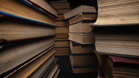 Library towers of old books, slider macro footage in antique shop, bookstore. - Powered by Shutterstock - Get 15% off with code: PIKWIZARD15