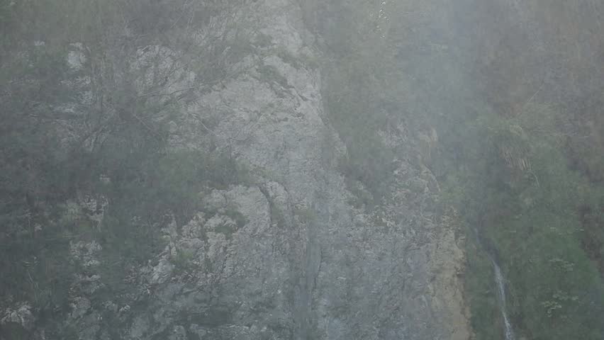 Panorama of Plitvice lakes in Croatia in summer. Wooden walkways over the crystal clear lakes transport us to an idyllic naturalistic landscape. An adventure between waterfalls, rivers and lakes.