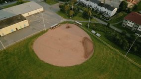 Aerial view of a baseball field with players. Male and female baseball players in action during a game in a baseball stadium. Baseball field with players in uniform playing the game. - Powered by Shutterstock - Get 15% off with code: PIKWIZARD15