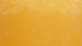 Orange juice with pulp, macro textures in a glass. - Powered by Shutterstock - Get 15% off with code: PIKWIZARD15