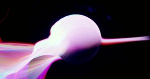 Vertical video of bright and vibrant, an abstract of vivid and intense rainbow of colors flowing around a sphere. Moving spectrum of color abstract background.