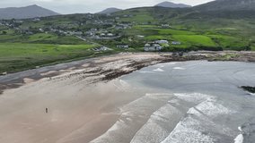 Aerial video of the rocks at Pollan Strand Ballyliffin Beach on the Atlantic Ocean in County Donegal Ireland 