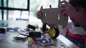 Young asia student learn online at home in coding robot arduino remotely, STEAM, mathematics engineering science technology - Powered by Shutterstock - Get 15% off with code: PIKWIZARD15