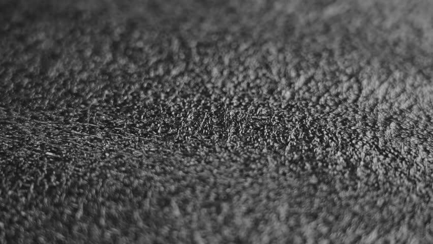 Black porous softening protective packaging plastic material with textured spongy surface. Rotation | Shutterstock HD Video #1107661169