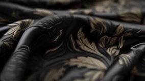 Luxury black silk fabric background texture. Slow panoramic camera motion, macro, deep focus (blur). High detailed 4K video.  Pattern texture surface panning background. 