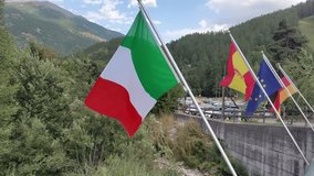 Italian and European flags waving on the bridge. High quality 4k footage