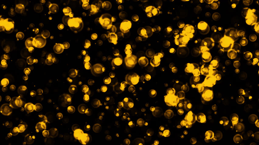 Beautiful loop falling gold ring circle on black abstract background.  Isolate using QuickTime Alpha Channel proress 444