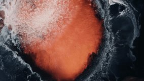 Abstract cosmic nebula effect showing paint ink in orange and blue color - waves flooding effect - Powered by Shutterstock - Get 15% off with code: PIKWIZARD15