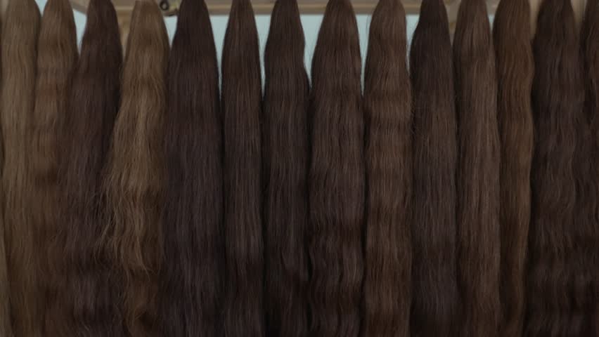 Real Hairpieces. Natural hair ready for woman wig production | Shutterstock HD Video #1107672843
