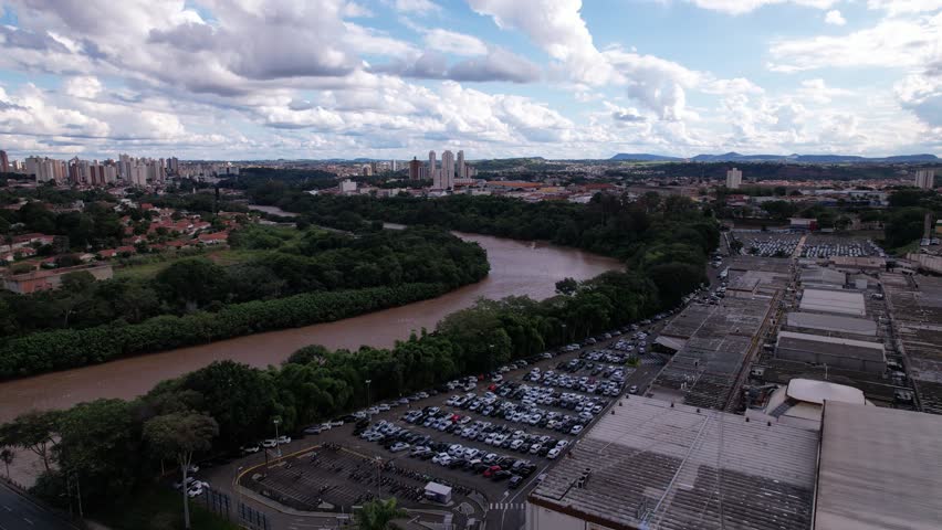 Aerial view of the city of Piracicaba, in Sao Paulo, Brazil. Piracicaba River with trees, houses and offices.