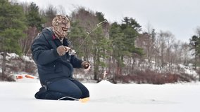 Catching yellow perch on frozen lake, ice fishermen nice catch video 