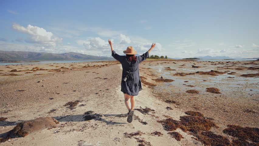 Girl with Camera Enjoying Desert Views in Slow Motion