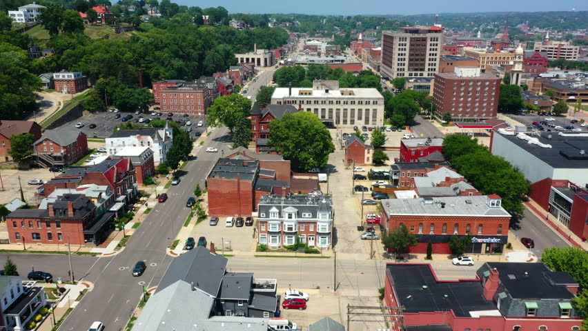 Aerial view panning over the cityscape of Dubuque, sunny day in Iowa, USA