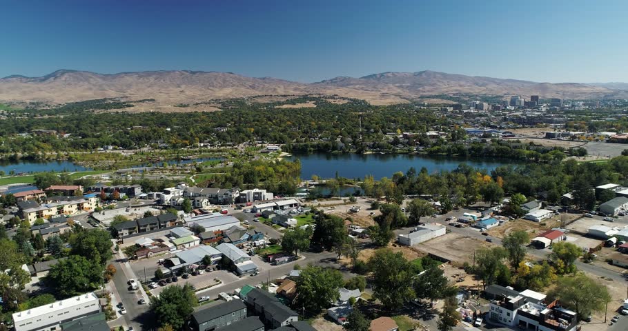 Aerial 4k view of downtown Boise, Idaho with industrial, commercial, residential buildings in the summer