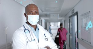 Animation of network of medical icons and data processing over african american male doctor. Global science, medicine, research, computing and data processing concept digitally generated video.