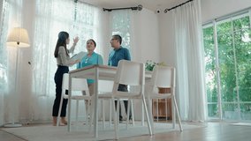 real estate agent is taking an elderly Asian couple for a tour of a house they are about to buy, real estate business concept, retirement life. - Powered by Shutterstock - Get 15% off with code: PIKWIZARD15