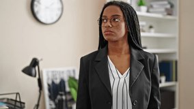 African american woman business worker looking at the watch waiting saying no with head at office - Powered by Shutterstock - Get 15% off with code: PIKWIZARD15
