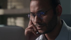 Close up pensive thoughtful male office worker reading bad news in laptop think concerned Indian man American businessman thinking problem solution worry anxiety difficulties business data failure - Powered by Shutterstock - Get 15% off with code: PIKWIZARD15