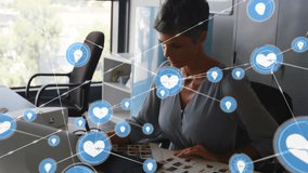 Animation of network of digital icons over caucasian female graphic designer using graphic tablet. Global networking and creative business technology concept - Powered by Shutterstock - Get 15% off with code: PIKWIZARD15