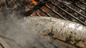 A video clip showcasing the process of grilling tonnarella fish.