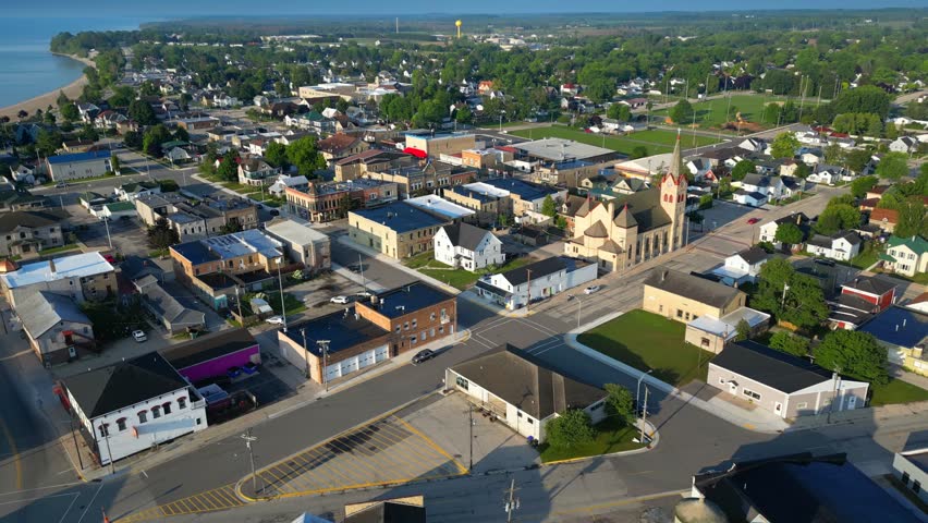 Beautiful Great Lakes harbor town, Algoma, Wisconsin, moving aerial view. 