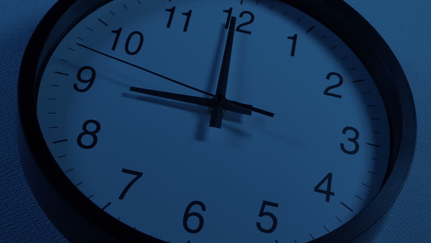Clock At 9 In The Evening Angled Shot Royalty-Free Stock Footage #1107733553