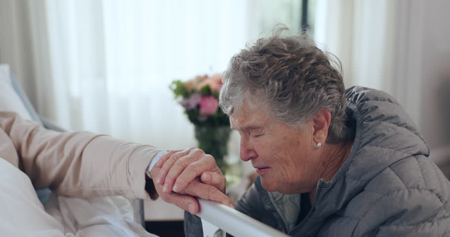 Sick, crying and senior patient, woman or death from cancer, medical or disease on hospital bed in hospice. Grief, emotional pain and elderly person depressed over dead family, old friend or partner Royalty-Free Stock Footage #1107737373