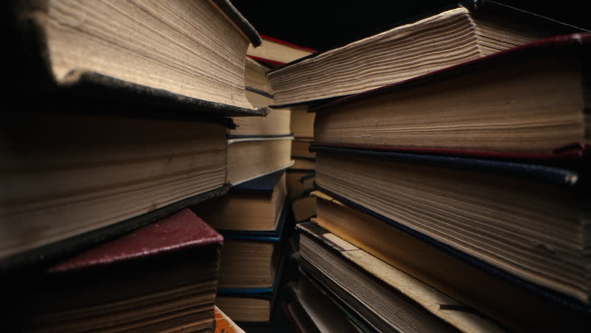 Library towers of old books, slider macro footage in antique shop, bookstore. Royalty-Free Stock Footage #1107740217