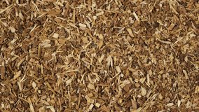 Crushed oak bark is used in folk medicine as decoction or tincture. Strong astringent with a tanning effect. 4K Video, Rotating.