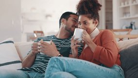 Happy couple, funny laugh and coffee on sofa, whisper and secret with chat, relax and together in home. Man, woman and smile with comic conversation on couch with matcha, coco or latte in living room - Powered by Shutterstock - Get 15% off with code: PIKWIZARD15