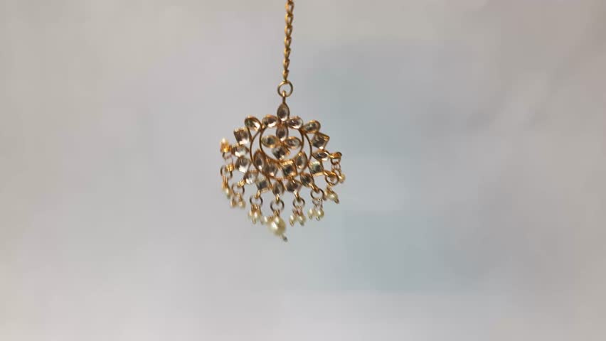 Vintage Golden pearl Multicolor Maang tika gold color rotating