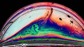 Colourful art image on liquid soap bubble on animation wallpaper background.