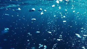 Bubbles in the sea. Camera moves through the cloud of bubbles underwater - Powered by Shutterstock - Get 15% off with code: PIKWIZARD15