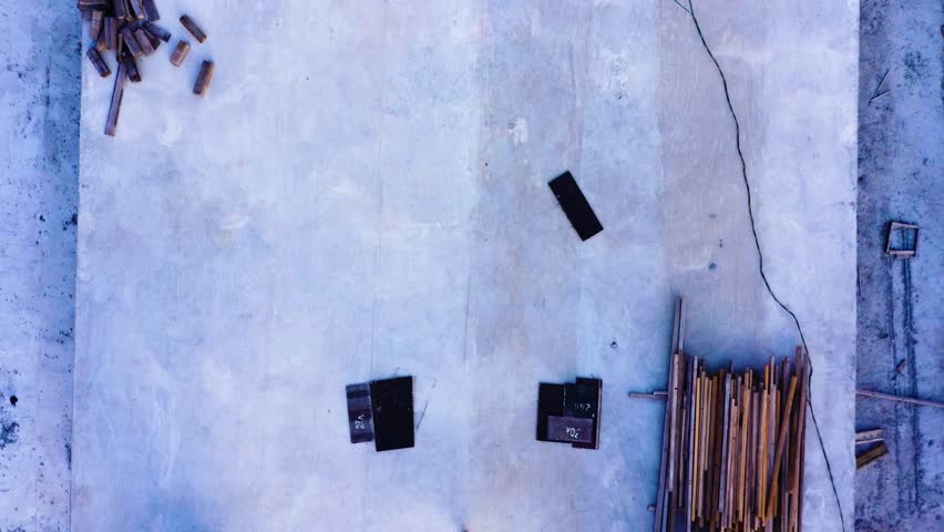 Woman in a white dress raises angel wings up. Young beautiful fantasy woman fallen angel. Aerial vertical, vertical video background.