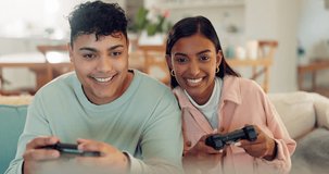 Gaming, play or happy couple with video games in arcade competition on website online at home. Smile, fun gamers or excited people live streaming on digital technology to relax in house living room