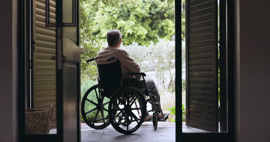 Elderly man, wheelchair and back with thinking, memory or vision of life, decision or choice by door. Depression, mental health and senior person with disability, retirement or remember idea on patio Royalty-Free Stock Footage #1107780759