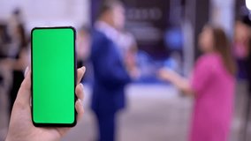 Green Screen and Chroma Key of Smartphone. Closeup. Businesswoman Using Smart Phone for Work. Woman Connects to Chat or Video Conference. Greenscreen of Chromakey Mock-Up 4K