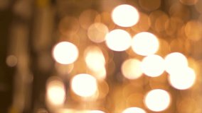 Experience the mesmerizing dance of lights in this captivating 4K video. Abstract orange bokeh creates a stunning visual spectacle, evoking feelings of warmth, energy, and creativity. Perfect for ad