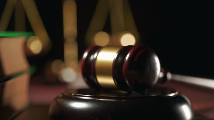 Close up of a judge gavel and a scales of justice. Legal lawyer books or codex. Concept of law or legal system and jurisprudence or court. Royalty-Free Stock Footage #1107802479