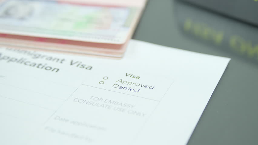 Close up visa application paper and stamp approved Royalty-Free Stock Footage #1107805485