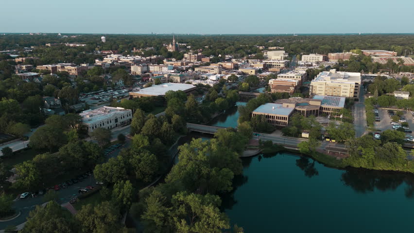 Wide Aerial shot of residential urban district downtown Naperville USA.  Royalty-Free Stock Footage #1107814941