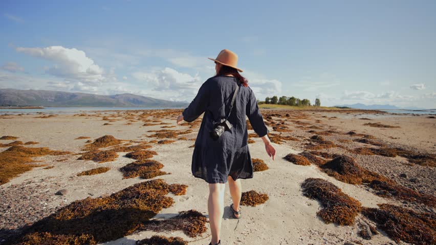 Nature Lover - Girl with Camera Admiring Desert Landscape in Slow Motion