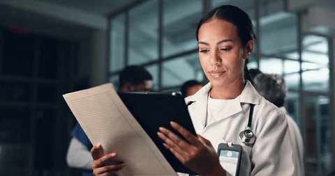 Doctor, woman and tablet with document, night and analysis for results, decision and info in hospital. Medic, digital touchscreen and paperwork for health, history and planning for thinking in clinic Video de stock