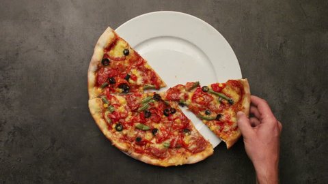 Hands taking pizza cuts - stop motion animation