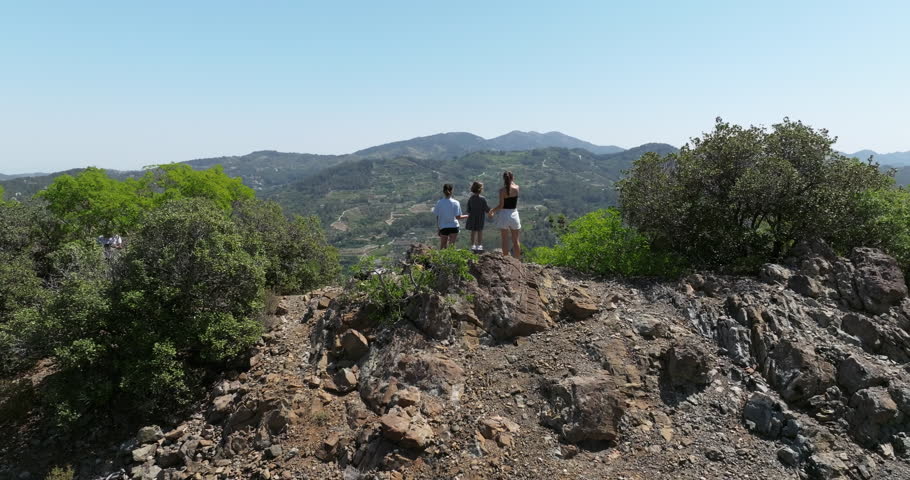 Aerial view of Mount Olympus. a family on a hike conquered the top of the mountain. Famous tourist current. High quality 4k footage