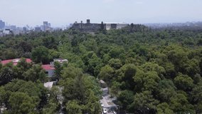 RAW footage 

bosque de chapultepec, a view with a sweet mix of mexico city at background, from chapultepec forest, fliying over a importat places of the history of México