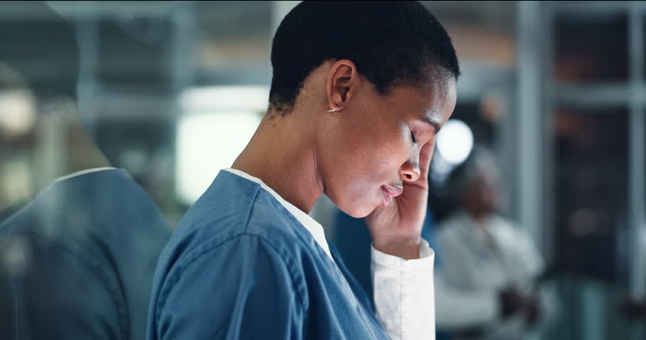 Doctor, stress and black woman with headache, anxiety or neck pain while working in a hospital at night. Healthcare, anxiety and female nurse with burnout, vertigo or joint, fibromyalgia or tension Royalty-Free Stock Footage #1107862533