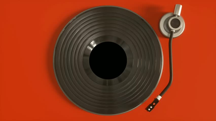 Black vinyl Retro record on DJ turntable. Black vinyl background with yellow screen in center. Rotating plate close up. Party. Loop. 4k video animation Royalty-Free Stock Footage #1107864809