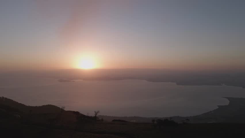 Aerial footage showcasing the dynamic sunrise from Mount Hira and Lake Biwa.